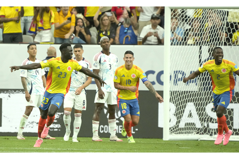 ◎ 哥倫比亞廿三號戴山齊士入波後喜洋洋,十號為老大哥占士洛迪古斯。昨早他們在美洲盃三比0贏哥斯達黎加隊。(美聯社)