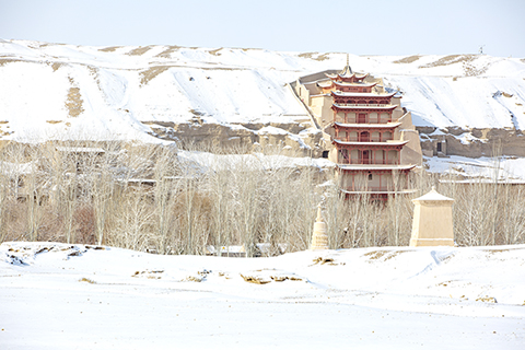 圖為甘肅敦煌市,雪後的莫高窟。(資料圖,敦煌市官方供圖)